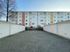 Gepflegte zwei-Zimmer-Erdgeschosswohnung mit Balkon und Garage in Dortmund-Scharnhorst! - Garagenhof