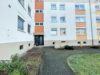 Gepflegte zwei-Zimmer-Erdgeschosswohnung mit Balkon und Garage in Dortmund-Scharnhorst! - Hauseingang