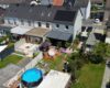 Angebotsverfahren: Modernisierte Doppelhaushälfte in Bergkamen! Mit Küche, Garten und PV-Anlage! - Hausrück Seite Drohne