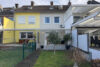 Modernisiertes Reihenmittelhaus in Marl-Brassert! Mit Einbauküche, Garage, Garten und Klimaanlage! - Hausrückseite