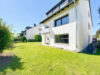Sanierungsbedürftige Erdgeschosswohnung in Schwerte-Ergste! Mit Garten und Garage! - Hausrückseite